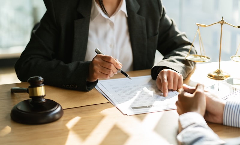 Good service cooperation, Consultation of Businesswoman and Male lawyer or judge counselor having team meeting with client.